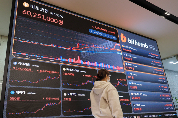 가상화폐-시장의-환희-비트코인-5만-달러-돌파-현물-ETF-승인-영향