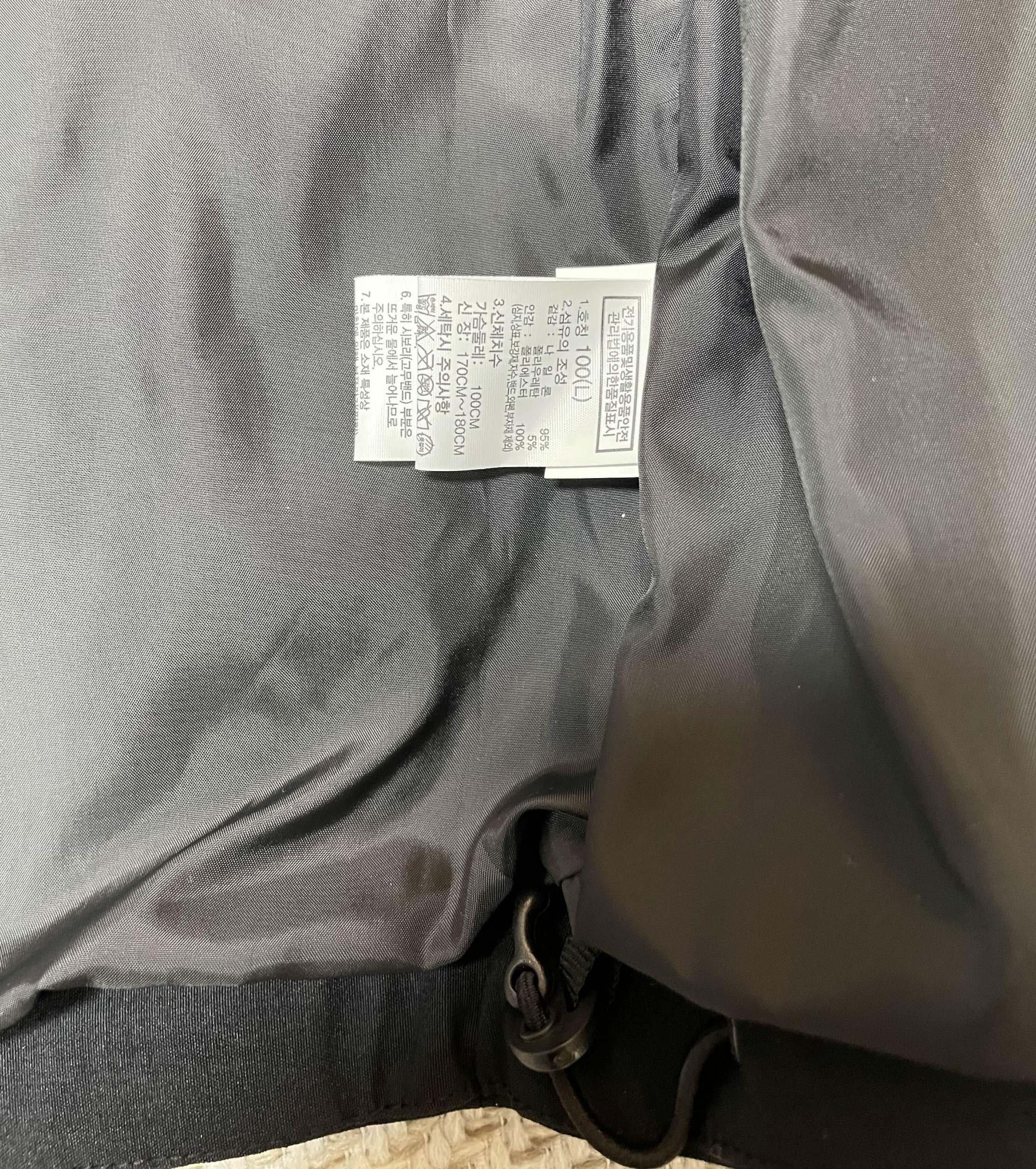 노스페이스 데날리 윈드자켓 측면 조임 스트링