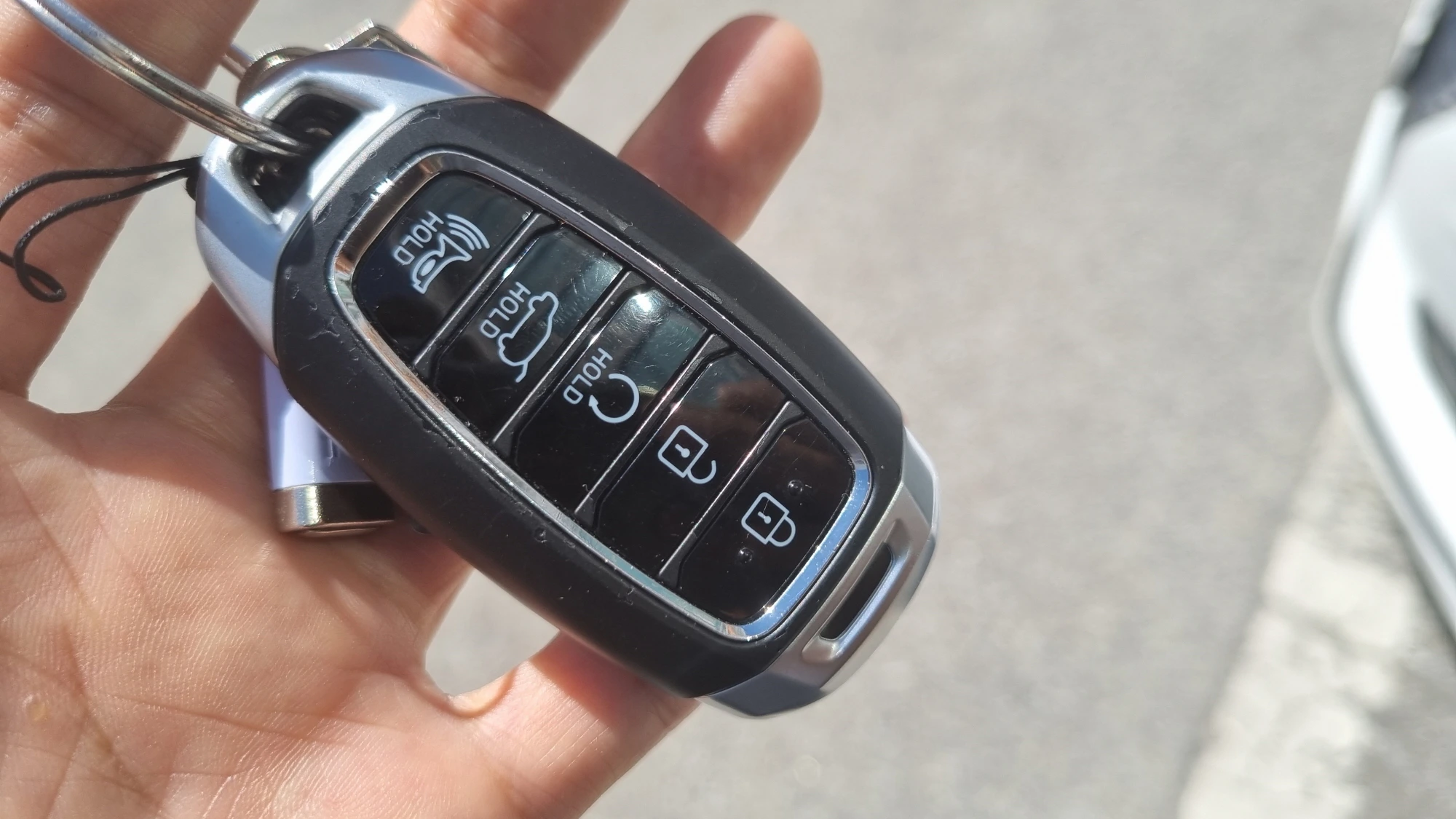 리모컨 테일게이트 열림 버튼