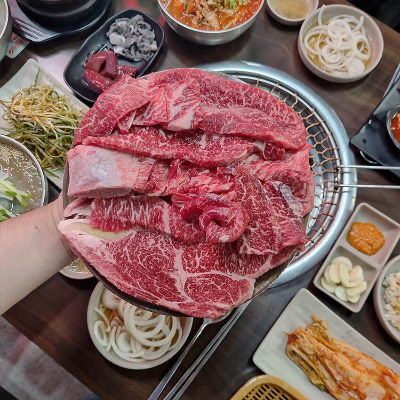 손에들고있는 한우