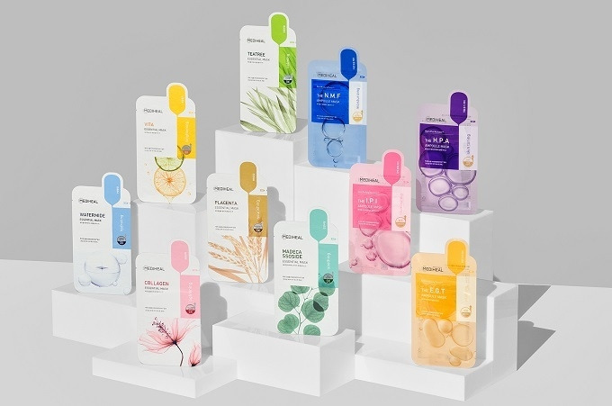 Mediheal sheet masks displayed at Olive Young, available in single packs and box sets.