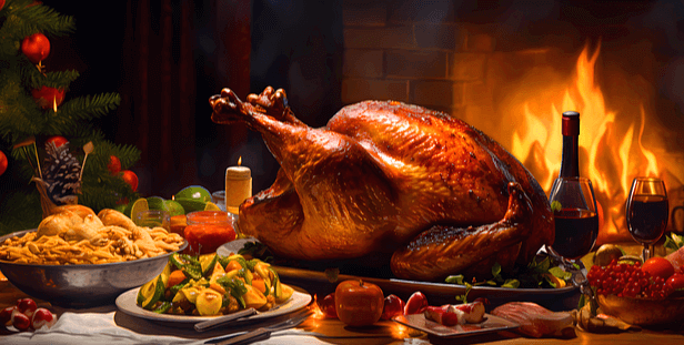 식탁 위에 커다란 갈색 칠면조 통구이가 있다. 주변엔 야채, 감자튀김, 사과, 레드와인이 있다.