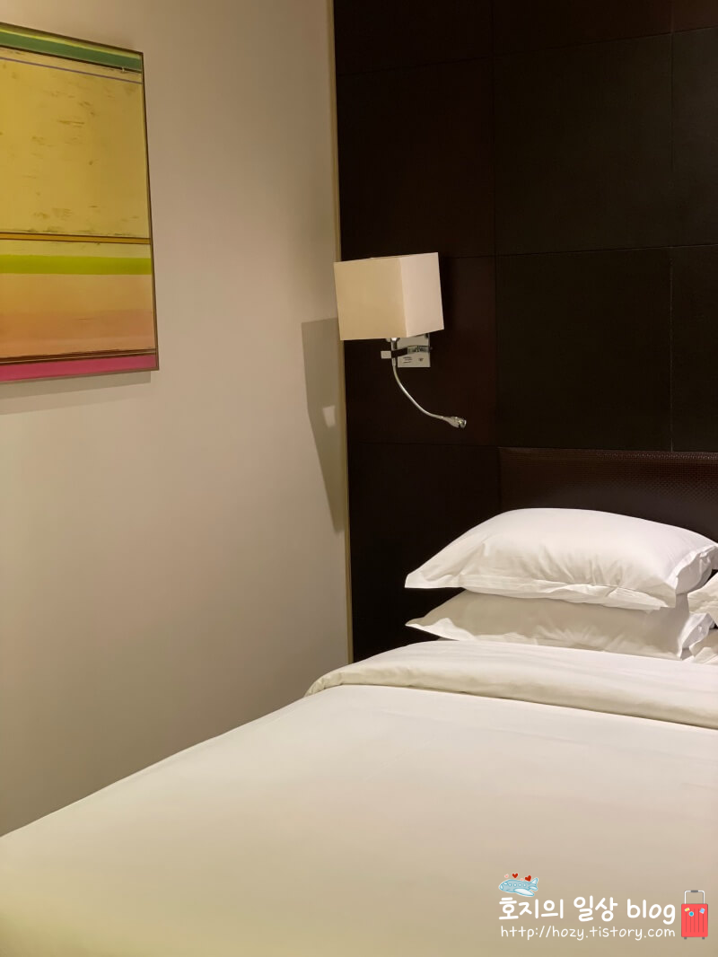 송도 쉐라톤 디럭스룸 침대