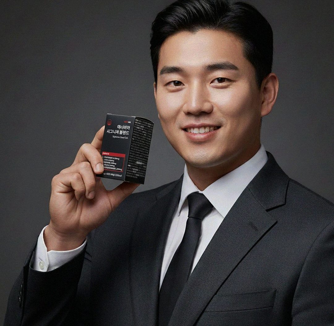 Korean Asian man in late 30s taking supplement after work at home