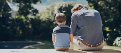 A dad talking to his child