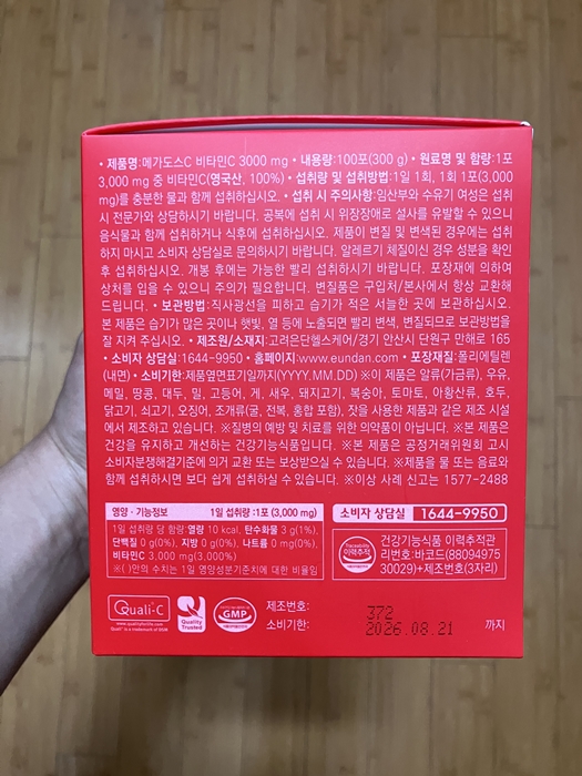 고려은단 메가도스C 3000mg 비타민C 박스 후면 상세 정보, 원재료 성분과 섭취 방법 및 소비자 상담 번호 안내