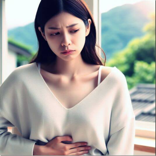 식중독 증상으로 배아픈 여성