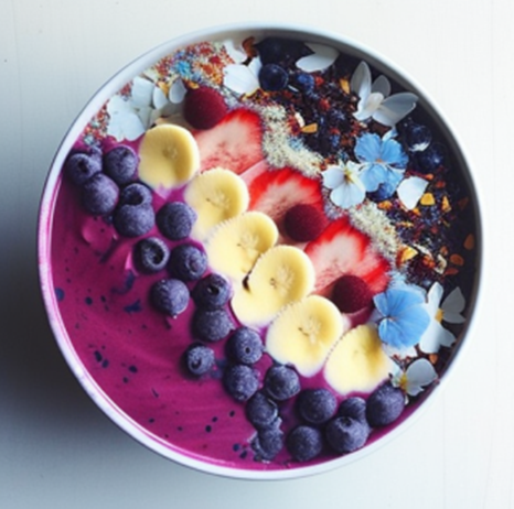 스무디볼안에 바나나 딸기 블루베리 등이 담겨져 있다