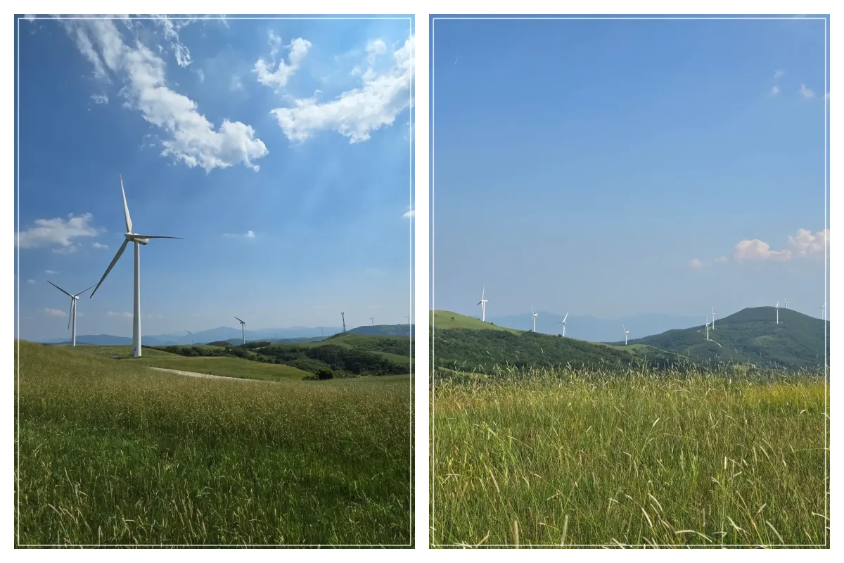 초록색초원_산정상_여러개의풍차_파란하늘_뭉개구름