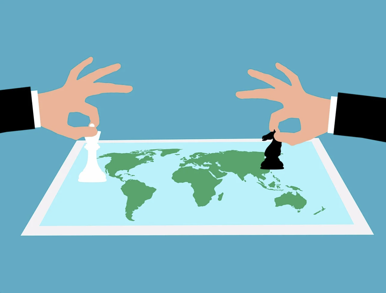 세계 지도 위에 체크 말을 두는 두 사람의 손