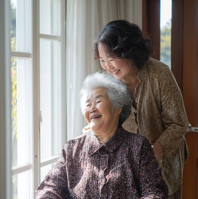 요양보호사가 휠체어를 미는 모습