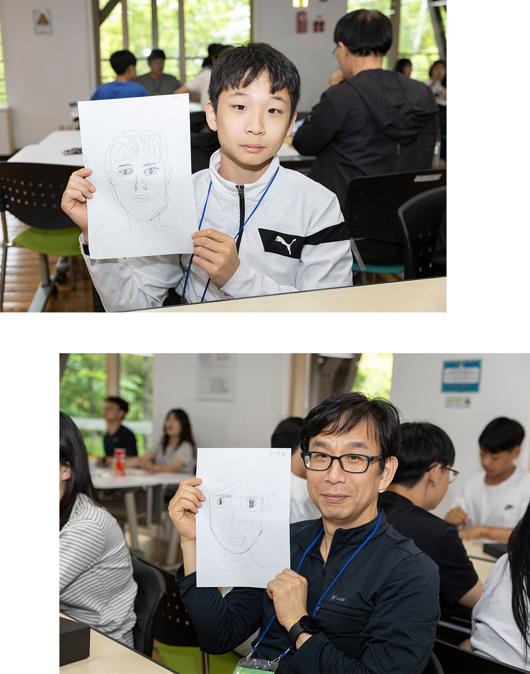 #초상화를 들어 보이고 있는 장학생과 가족