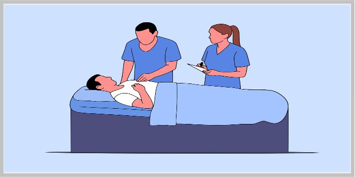 환자 침상 옆에서 진료를 준비하는 남녀 의료진, 대장내시경 전후 진료 모습 또는 입원 치료 상황