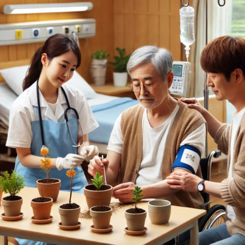 호스피스 병실에서 환자가 원예치료사와 자원봉사자와 함께 원예치료를 받고 있는 장면