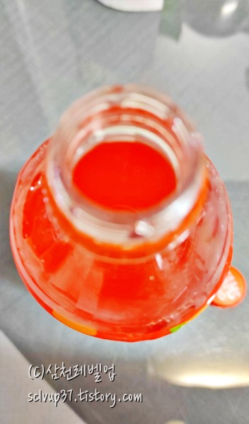 롯데칠성음료 탐스 제로 오렌지 600ml 개봉 후