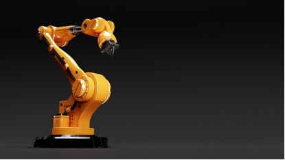 산업 현장에서 쓰이는 로봇팔의 사진