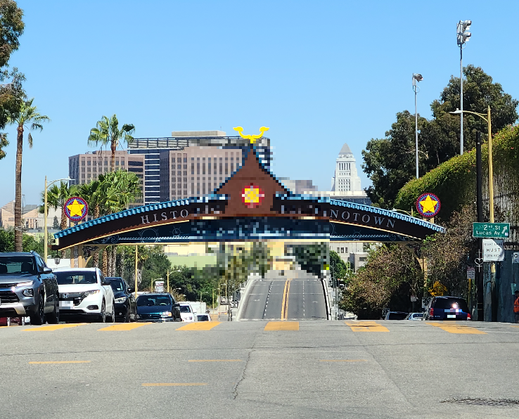 도로에 큰 관문이 세워져 있다. 관문에는 HISTORIC FILIPINOTOWN이라고 쓰여 있다. 