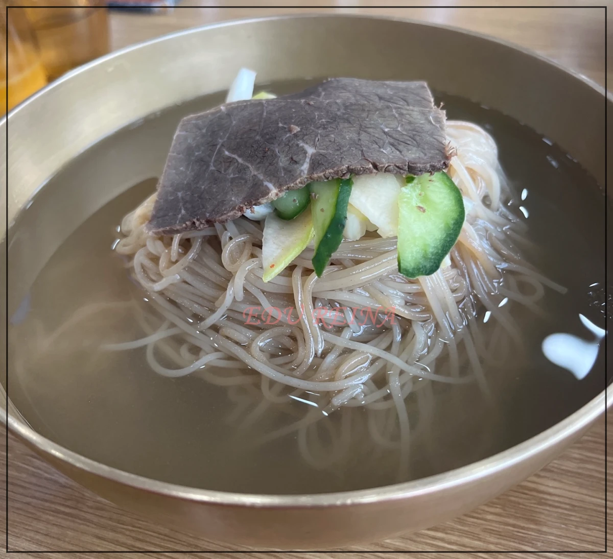 장수관-일산-평양냉면-고명-고기-오이-무