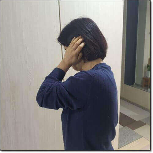 이명 증상이 있는 여성