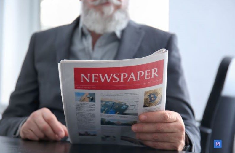 불경기 경제 뉴스를 읽으며 멘탈 관리하는 방법을 고민하는 중년 남성 via Canva