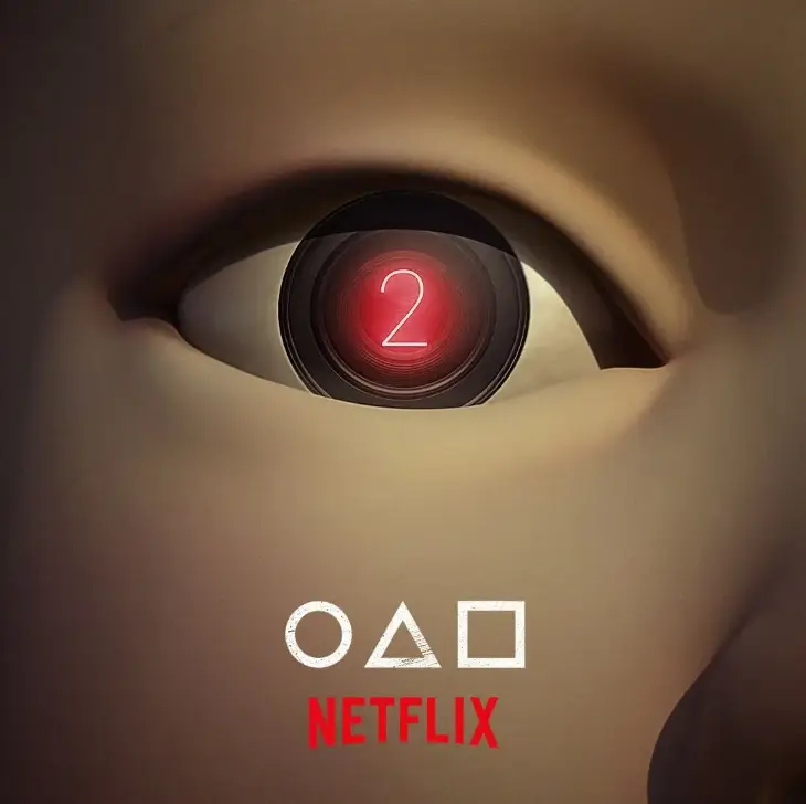 오징어 게임2-
인형의 눈안 까만 눈동자 가운데 빨간색 동그라미 안 숫자 2