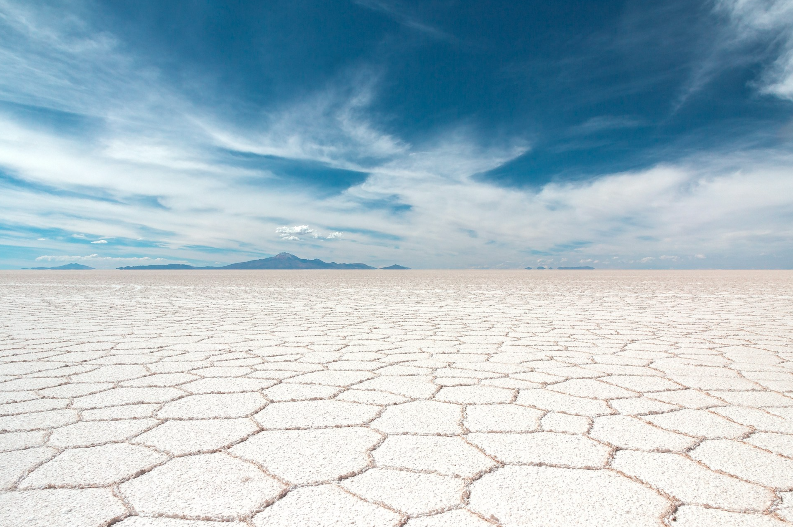 The endless white expanse of the Salar de Uyuni salt flats in Bolivia