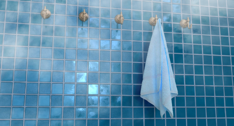 샤워 후 수건 관리와 욕실 청결 유지, 파란 타일 욕실 인테리어 이미지
