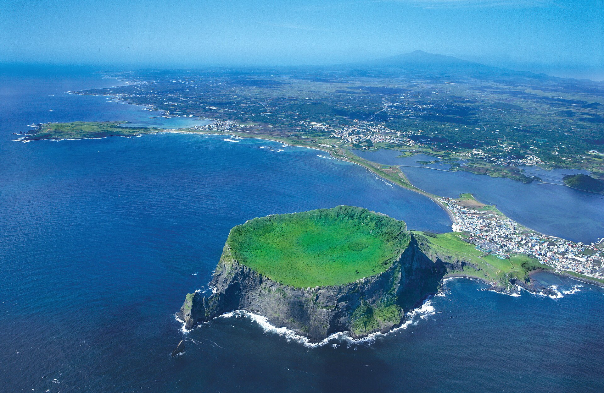 Aerial view of the Seongsan Ilchulbong crater and Seongsan village