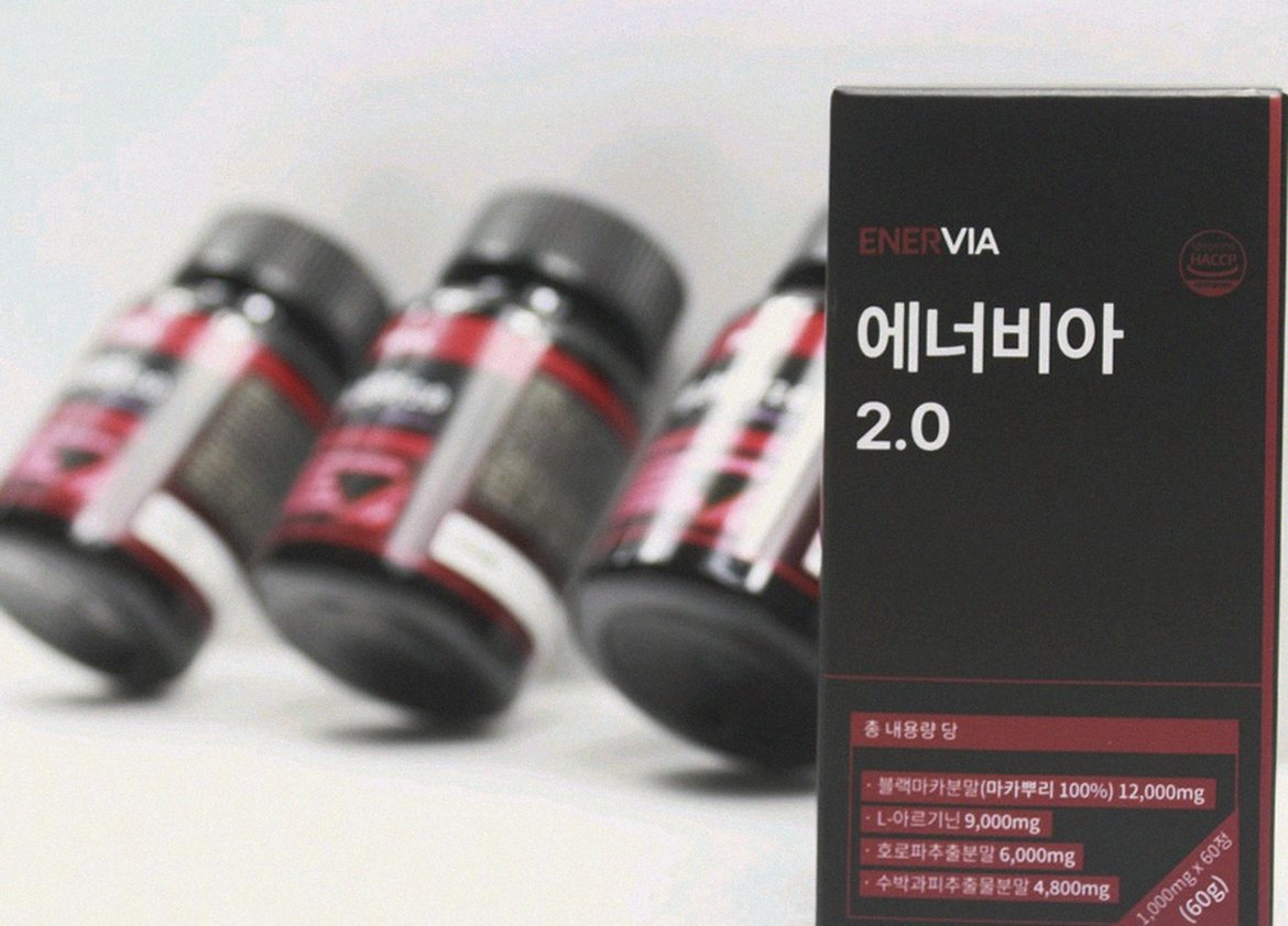 Korean Asian man in early 40s morning routine with supplement before work