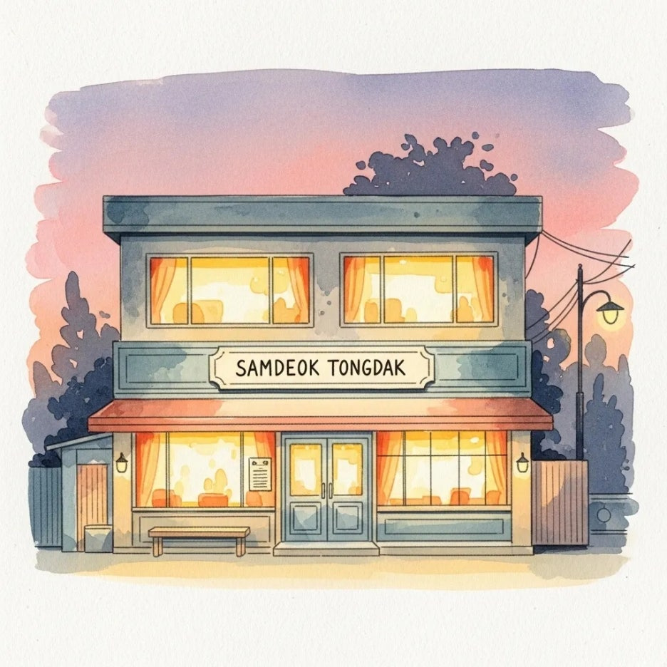 따뜻한 불빛이 새어 나오는 삼덕통닭 매장 외부.