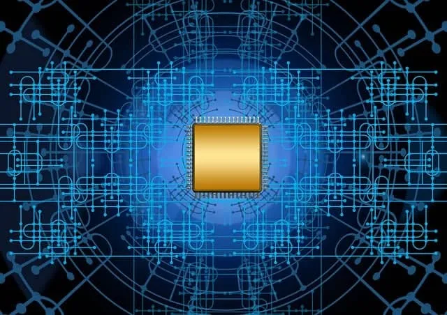 중앙의 금색 칩을 중심으로 대칭적으로 퍼지는 푸른 회로 패턴이 배경을 이루는 디지털 아트 스타일 이미지. 미래지향적인 느낌의 전자회로가 정밀하게 구성되어 있다.