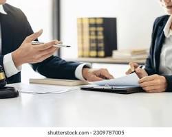 Lawyers discussing legal documents