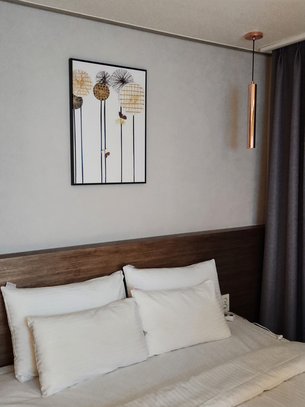 디럭스_더블룸_침대