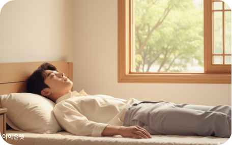 다시 침대 위로 돌아온 청년