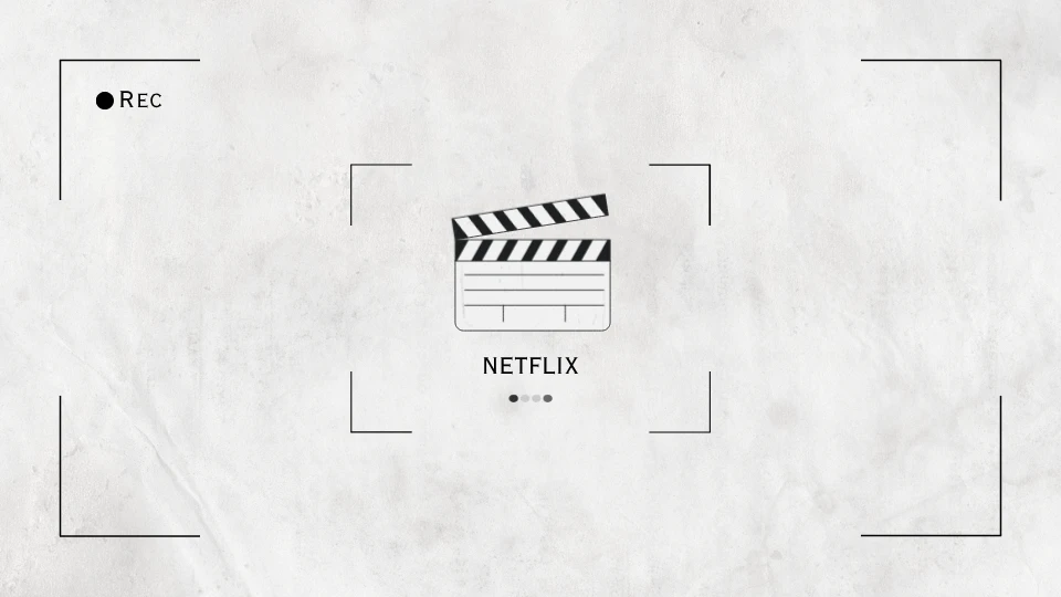 영화 편집 소품 슬라이드가 가운데에 있고 아래 NETFLIX라고 작게 적었다.