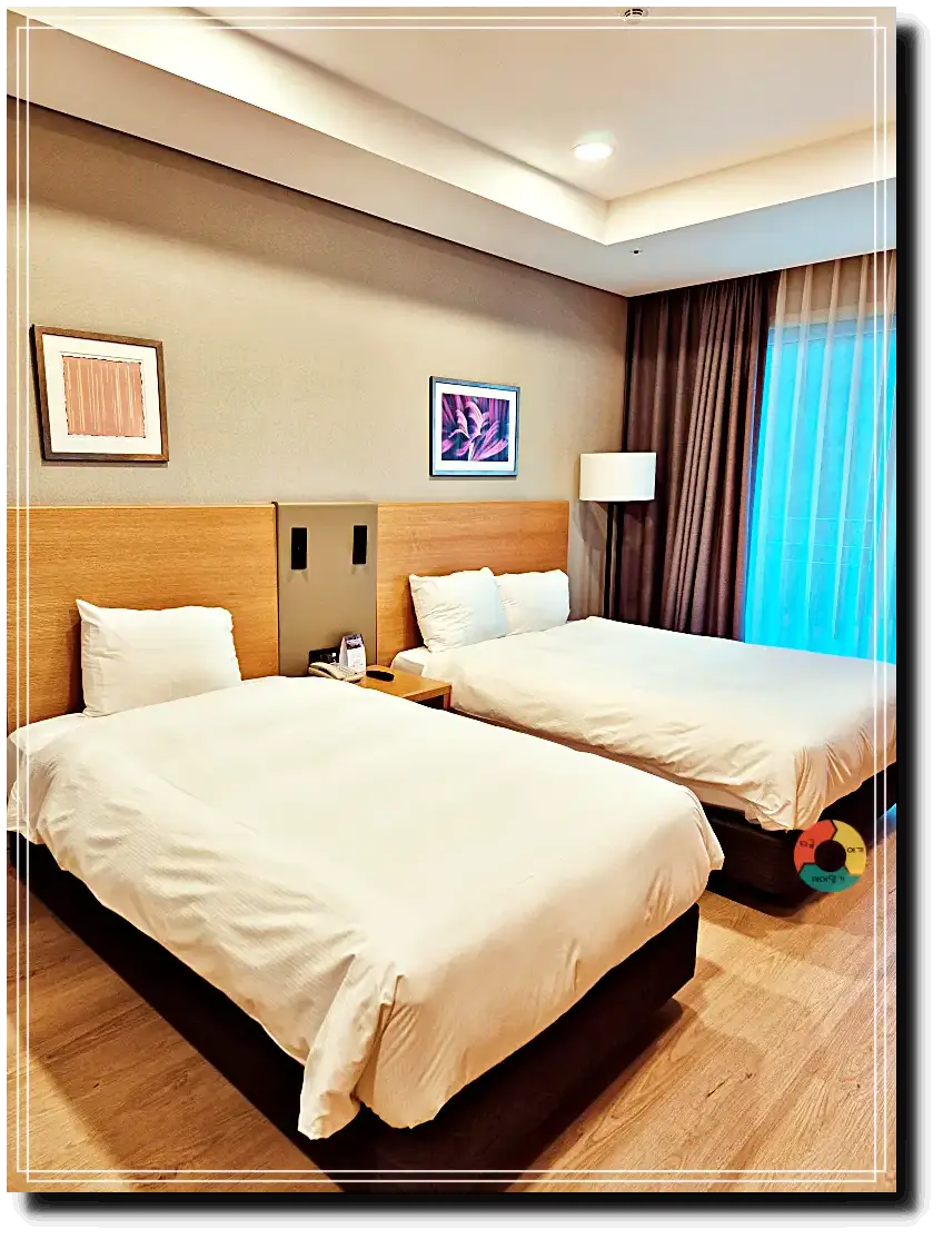 곤지암리조트_침대2-왼쪽-싱글-오른쪽-더블-침대위-액자