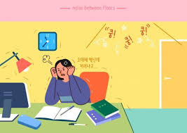 층간소음 걱정 줄이는 인테리어 여자가 책상에 앉아 층간소음으로 괴로워하는 모습