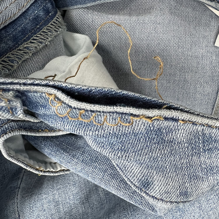 상침, 하침이 풀려 봉제가 되지 않은 현상