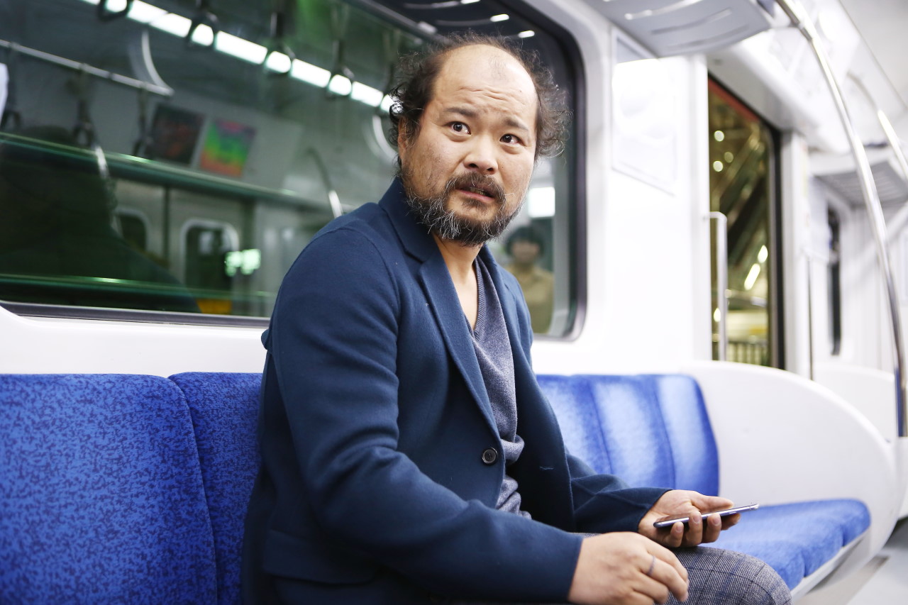 김상호로 모습이 변한 우진