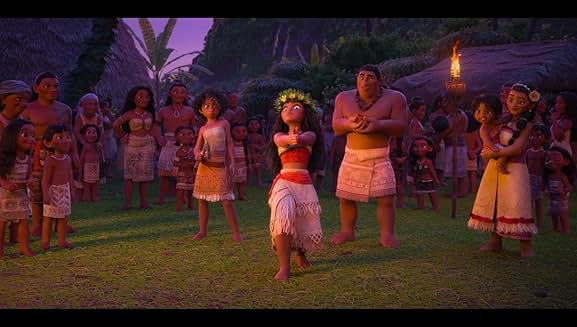 Moana dancing during a village ceremony surrounded by her people in Moana 2