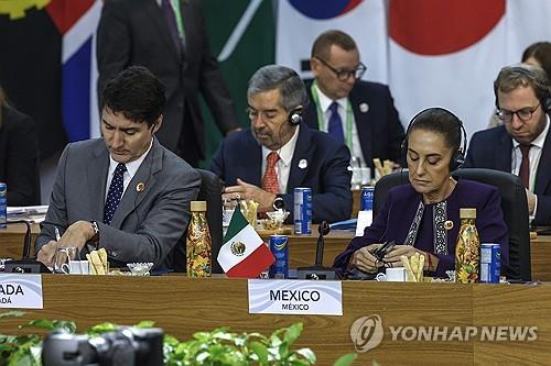 트뤼도 캐난다 총리(좌)와 셰인바움 멕시코 대통령.(사진출처=연합뉴스)