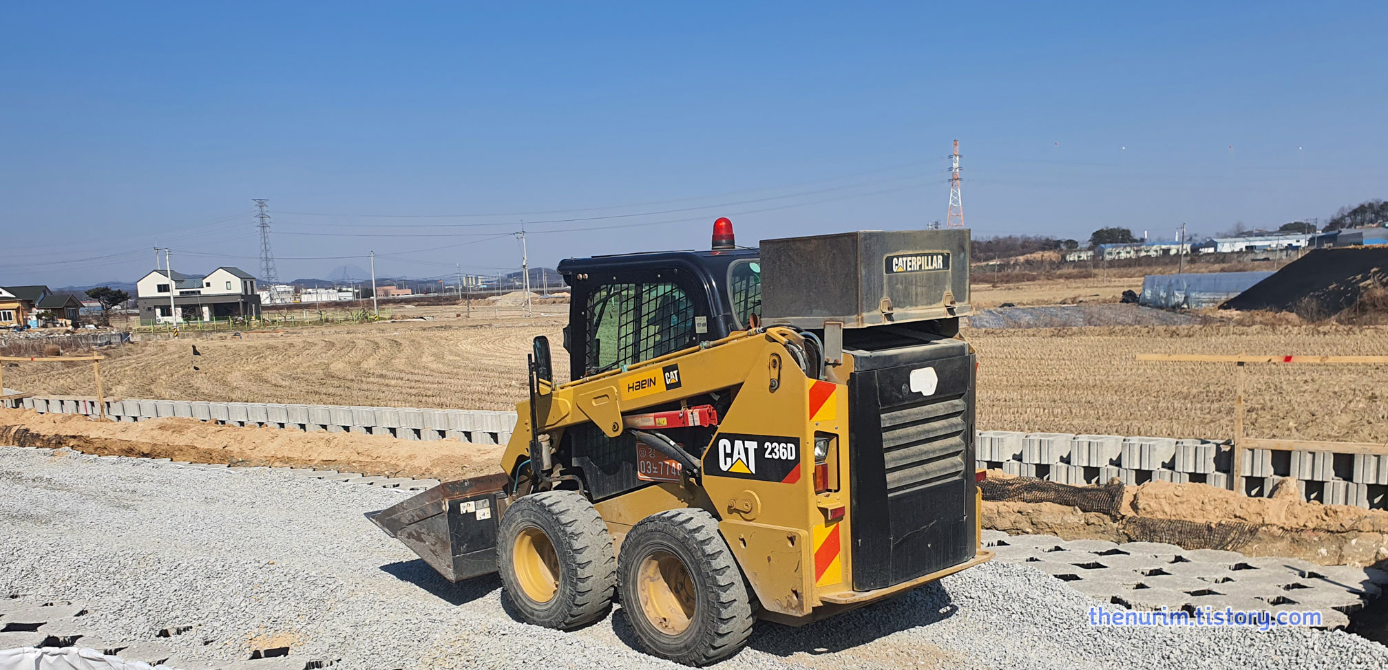 스키로더-캐터필라