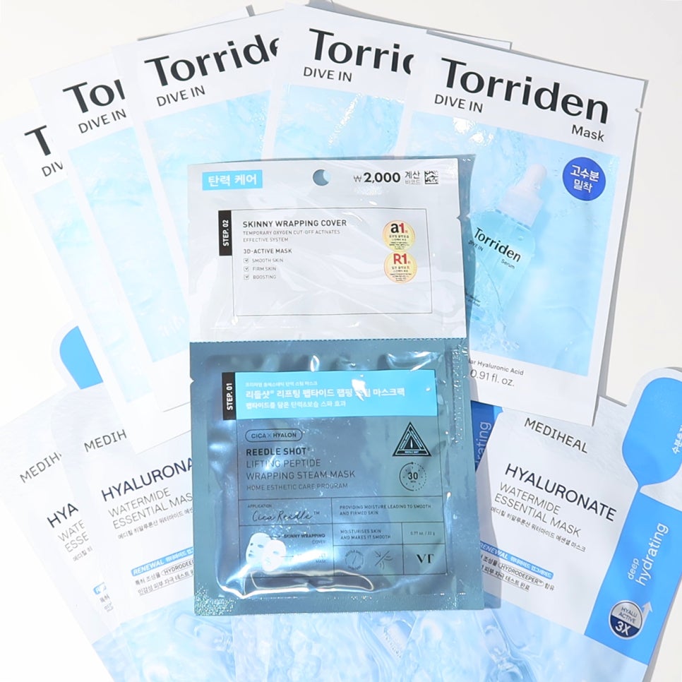 다양한 브랜드의 마스크팩이 배열된 모습, VT 마스크팩과 Torriden, Mediheal 제품이 함께 보임.