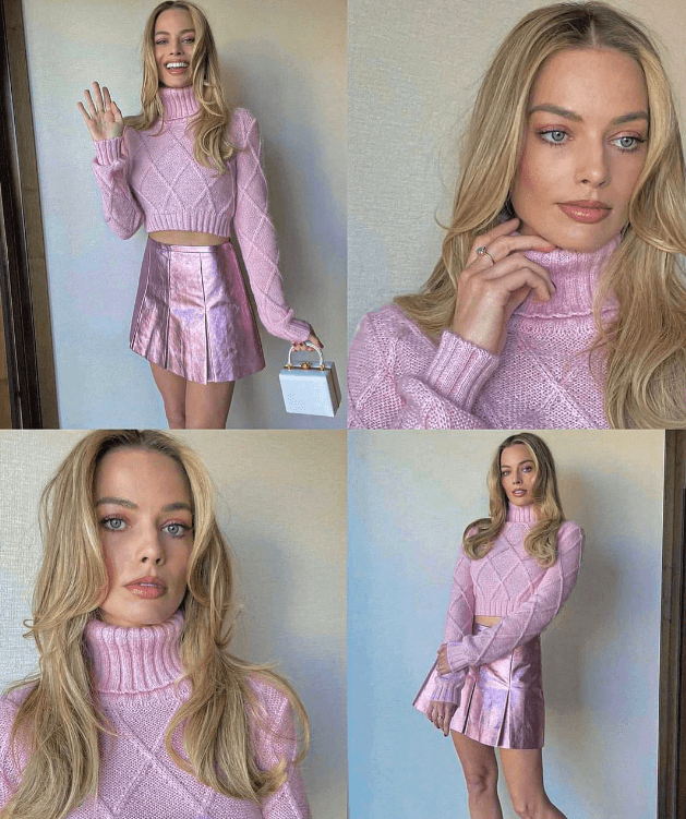 마로 로비가 핑크색 목이 올라오는 스웨터와 광이 나는 핑크색 미니 스커트를 입고 사진을 찍는 장면