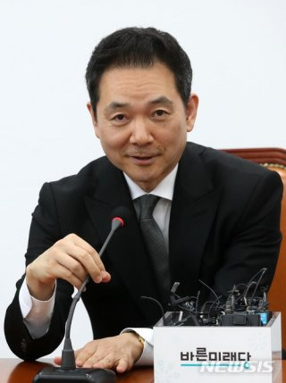 장성민 민주당 정치 입문