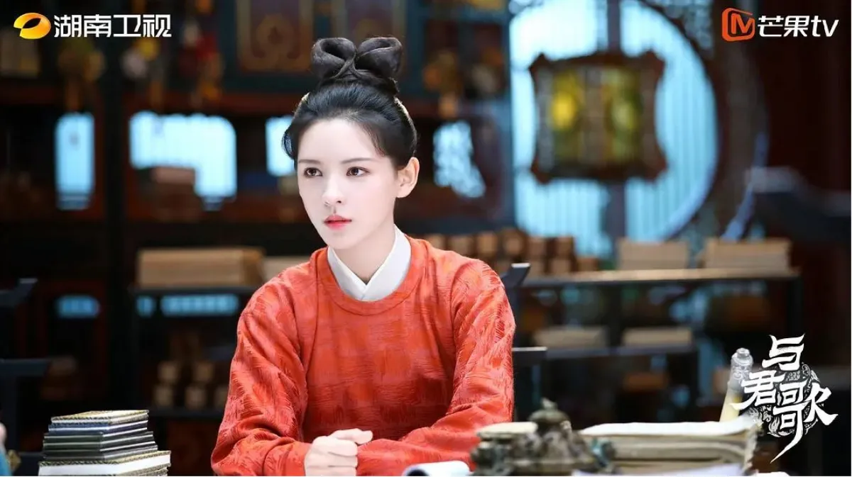 붉은옷을-입고-앉아있는-정약어
