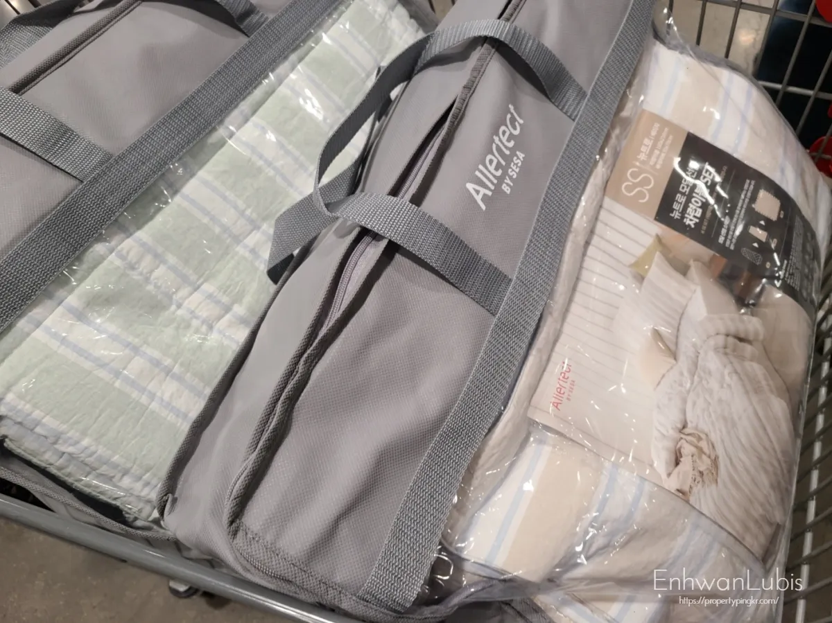 카트-안에-민트색이불-베이지색이불-이불가방-2개