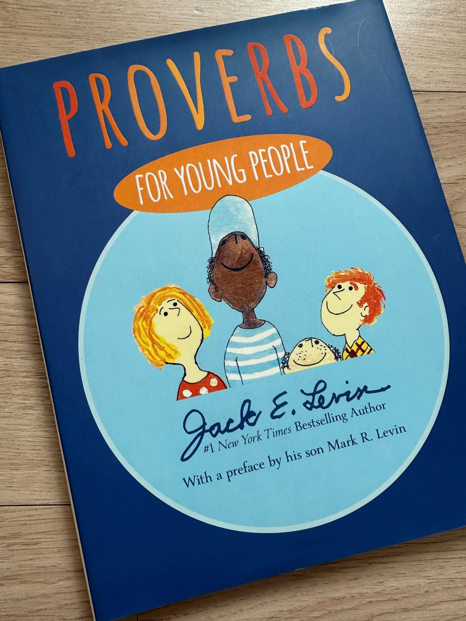 Proverbs-for-young-people-어린이들의-얼굴이-그려진-책표지