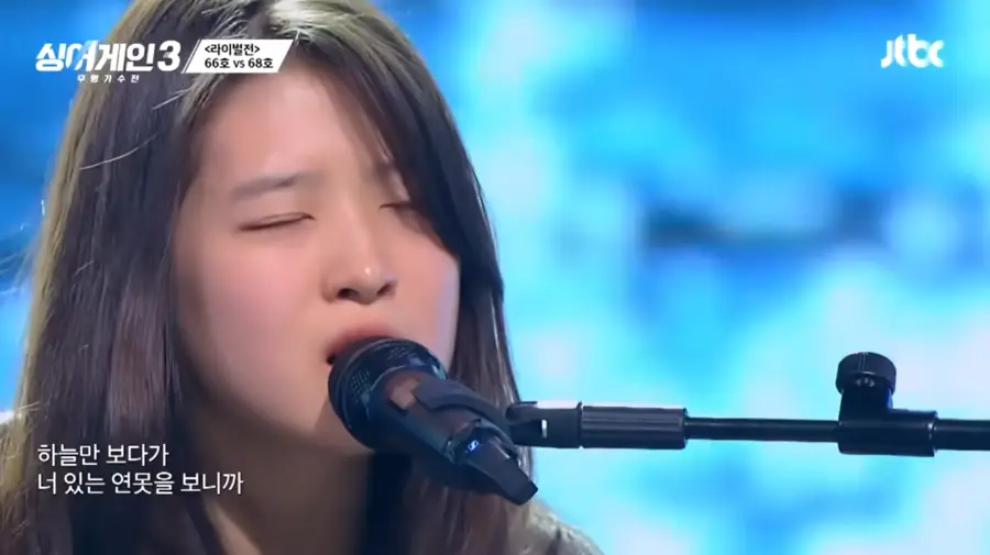 싱어게인3-
긴생머리를 늘어뜨린채 스탠딩마이크에 입을대고 눈을 감은채 노래하는 68호