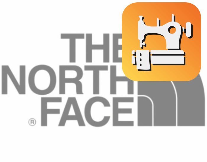 노스페이스 브랜드마크 배경에 재봉틀